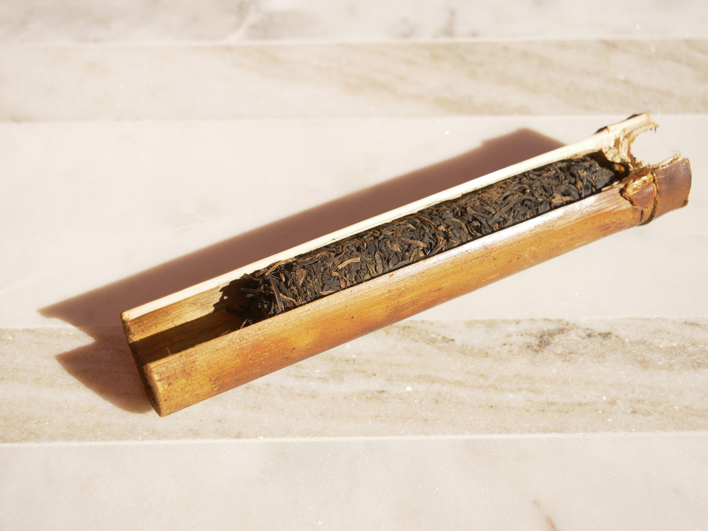 bamboo tube cross-section filled with tea leaves