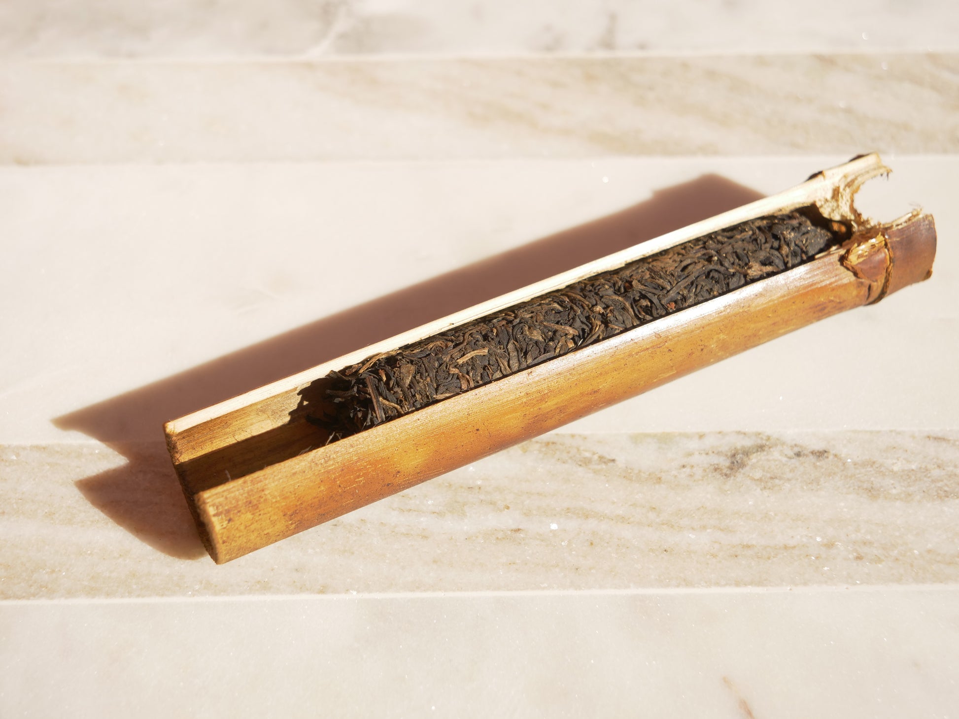 bamboo tube cross-section filled with tea leaves